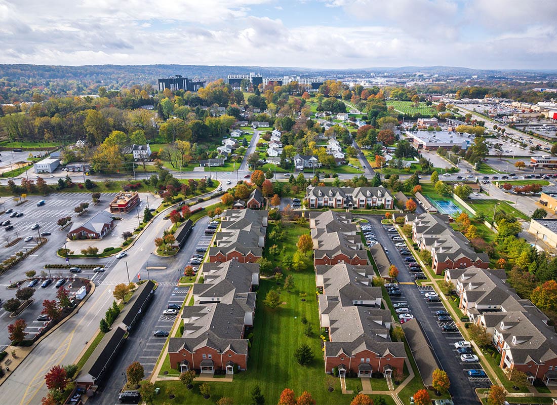 King of Prussia, PA - Local Stunning View of a Stretch of Builings Withcluds and a Blue Sky of the Town in PA